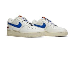 Nike Women’s White and Blue Sneakers